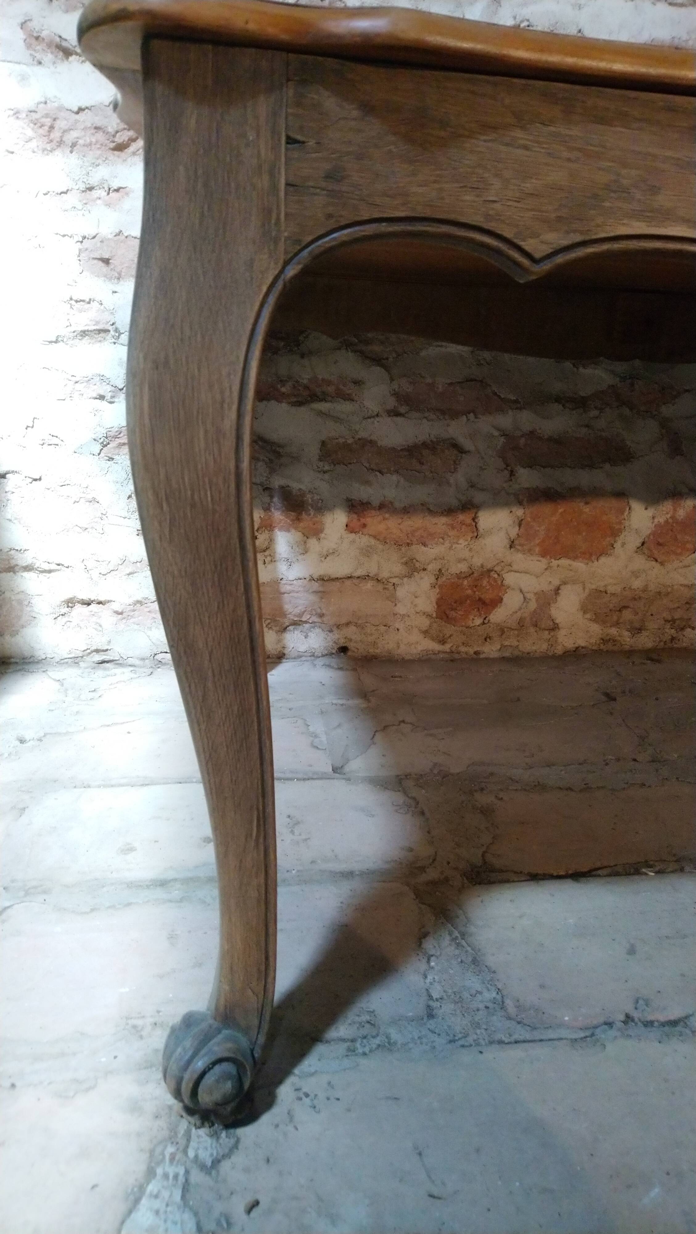 Louis XV style table in oak and cherry wood.