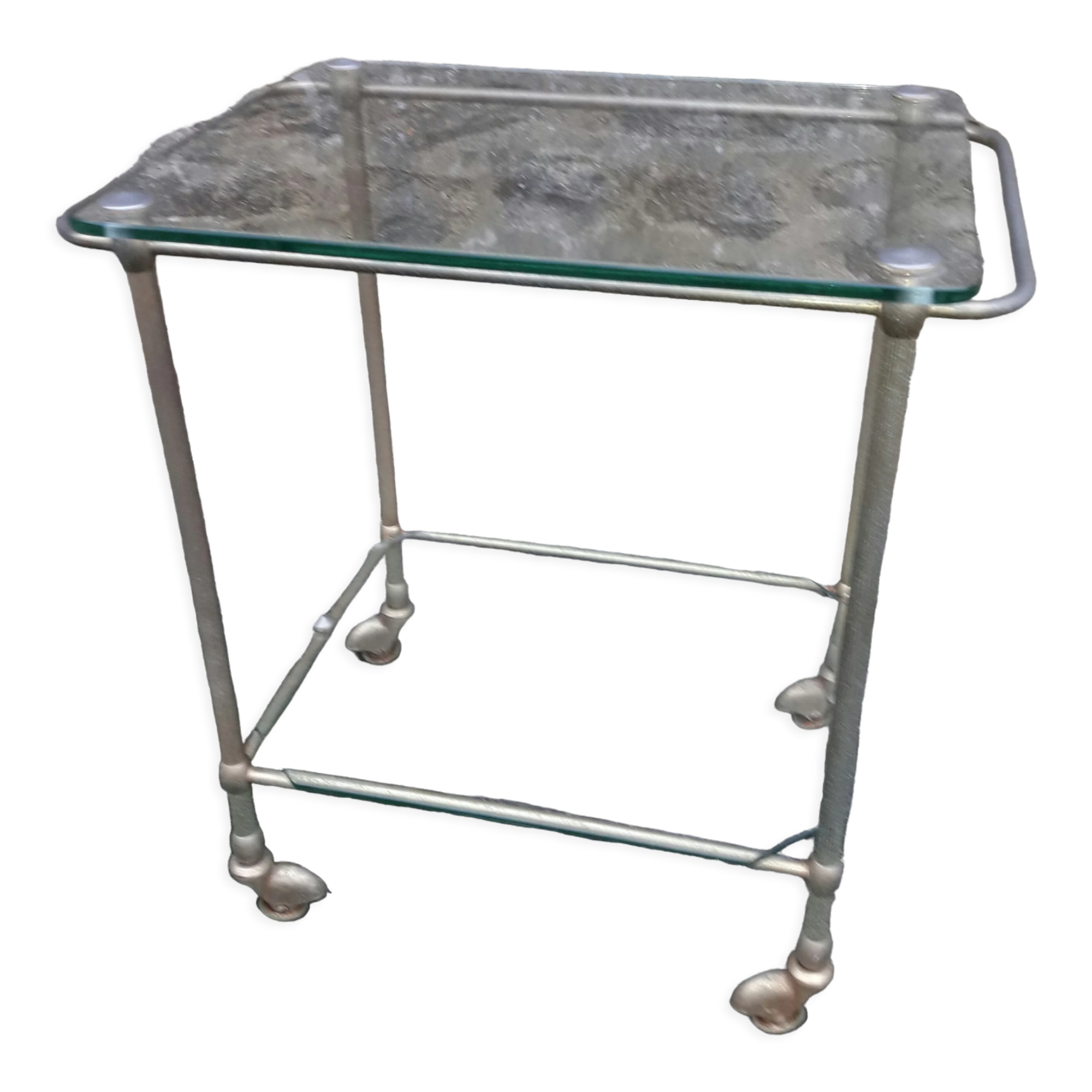 Small rolling table in glass and gold metal