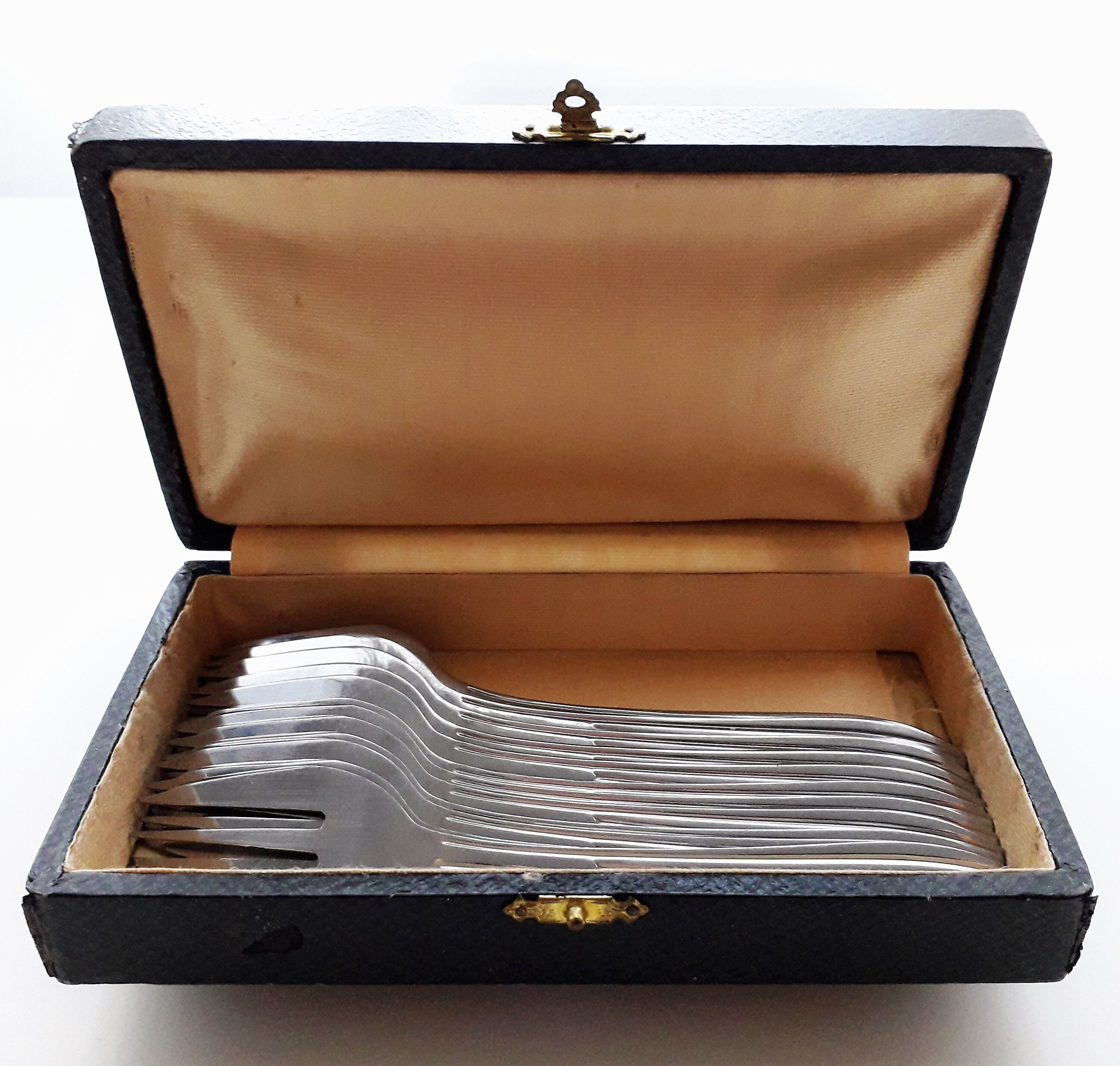 Antique oyster fork set.