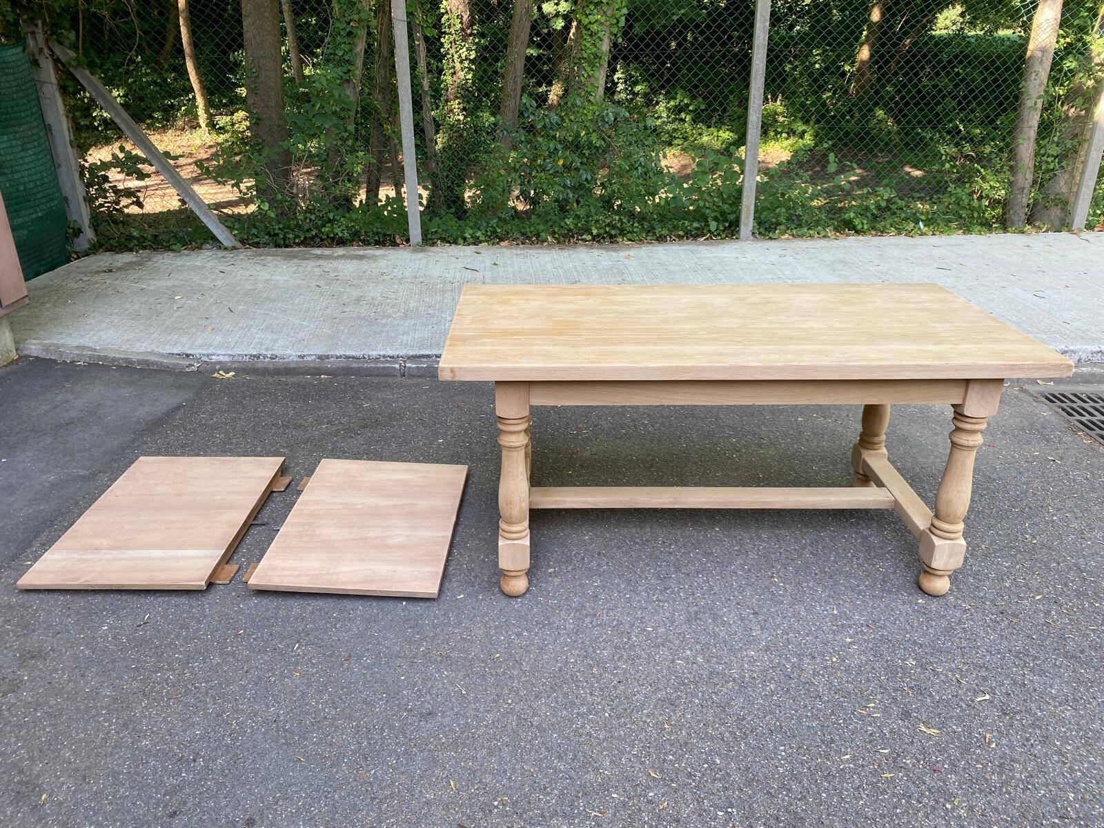 Renovated extendable farmhouse dining table made of solid raw oak from the 1950s.