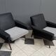 set of two black and white arm chairs 1960s