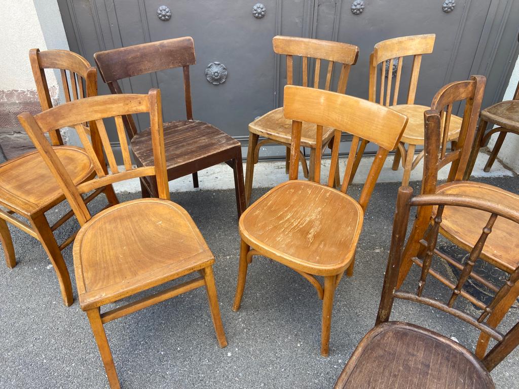 Set of 10 mismatched curved wood bistro chairs from the 1950s-60s