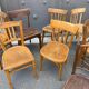 Set of 10 mismatched curved wood bistro chairs from the 1950s-60s