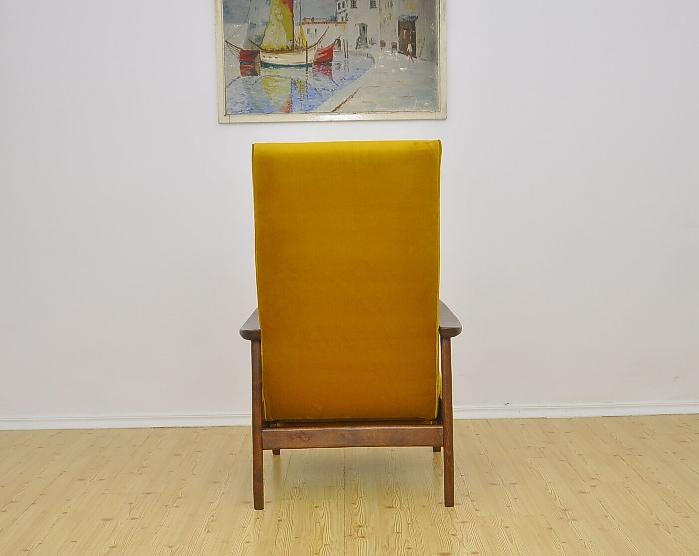 Mid-century armchair with folding footrest, 1960s