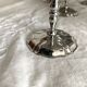 Vintage stainless steel cups on foot
