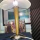 Table lamp legs chrome wood lampshade opaque glass.