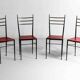 Fine set of metal dining chairs with red leather seating, Italy 1970s