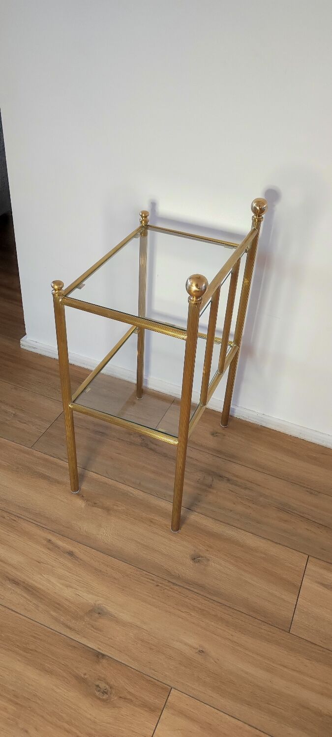 Bedside table in brass and glass.