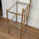 Bedside table in brass and glass.