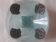 Handcrafted glass fruit bowl with ribbed design set with pewter medallions.