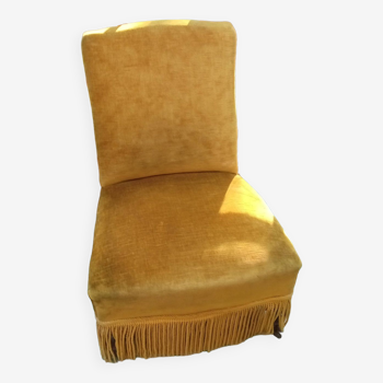 Fauteuil rapaud en velours moutarde