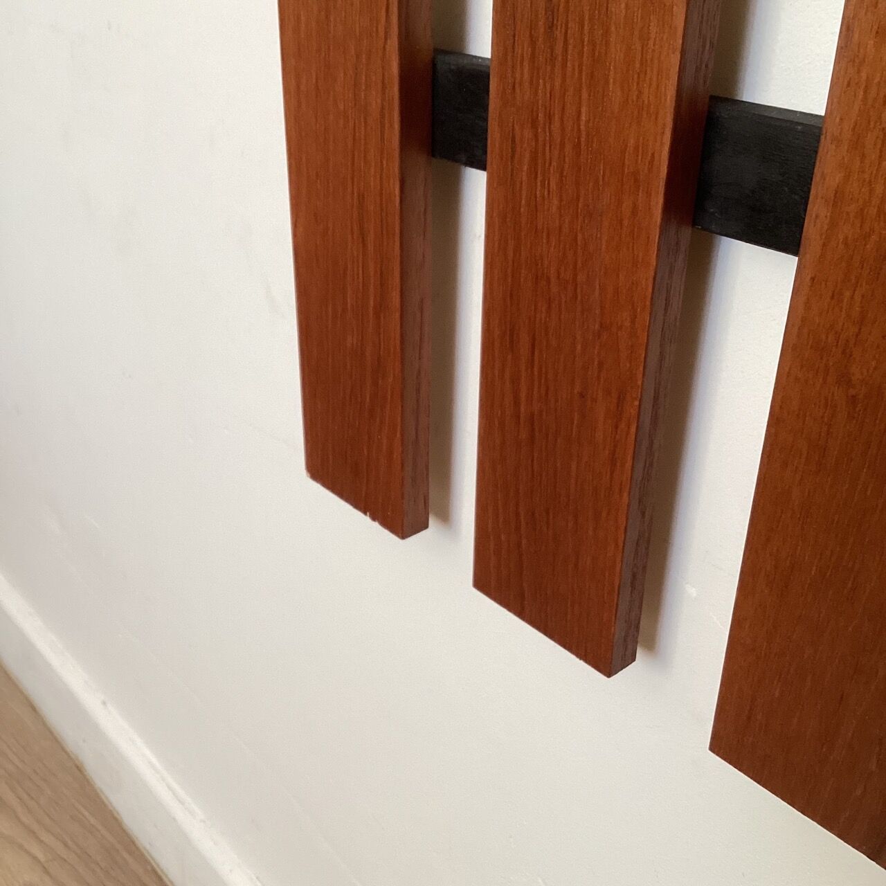 Wooden wall coat rack
