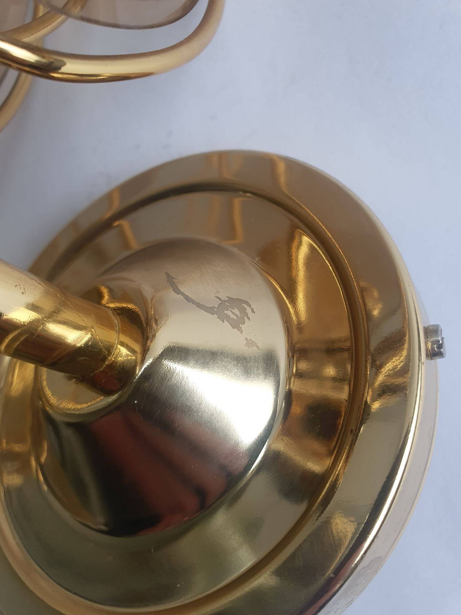 Pair of vintage brass wall sconces with glass shades