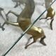 Hollywood Regency style coffee table, 6 patinated brass horses and glass top, 1970.
