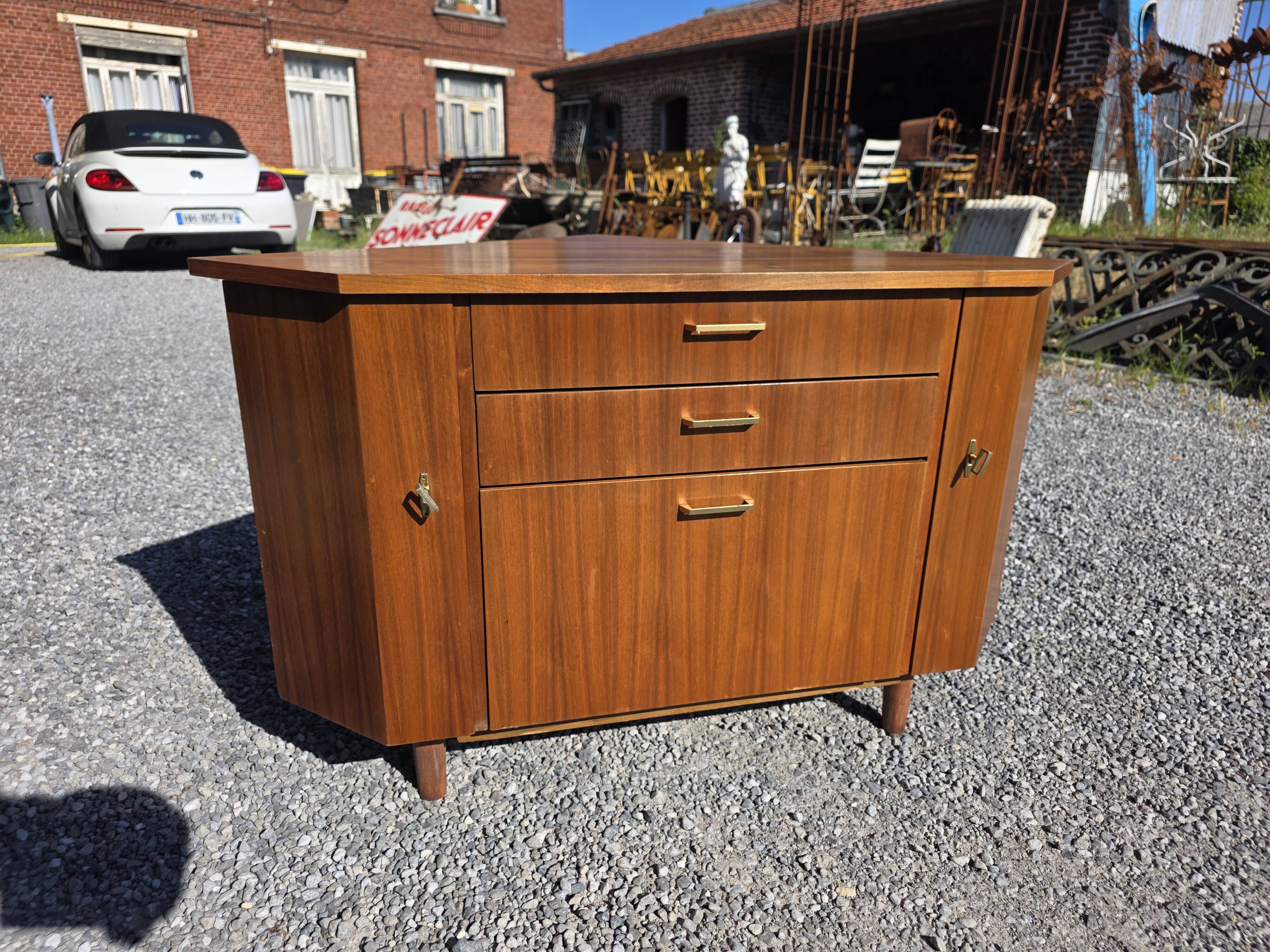 Scandinavian corner unit in teak from the 1960s.