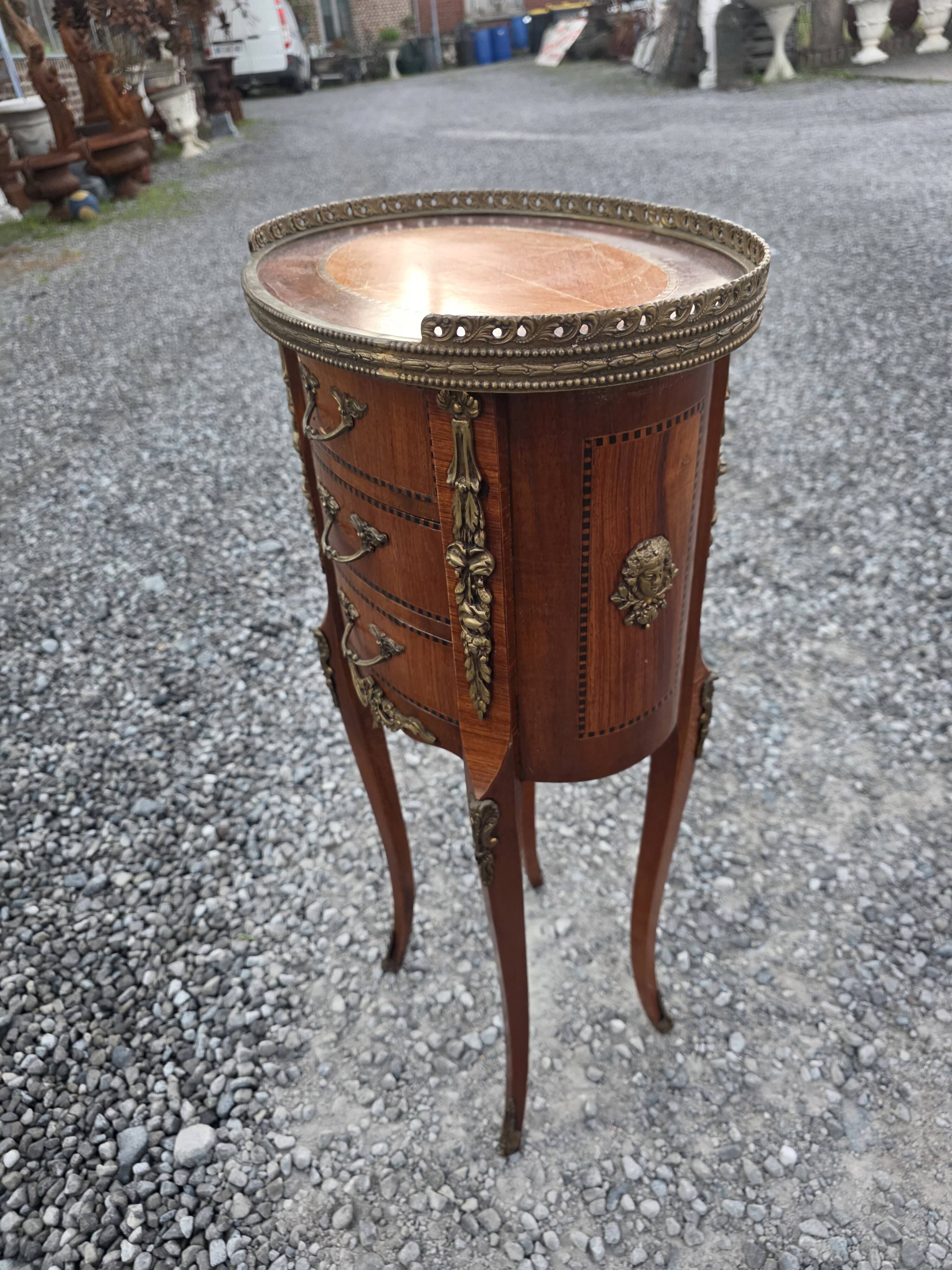 Oval bedside table in Louis XV style with marquetry.