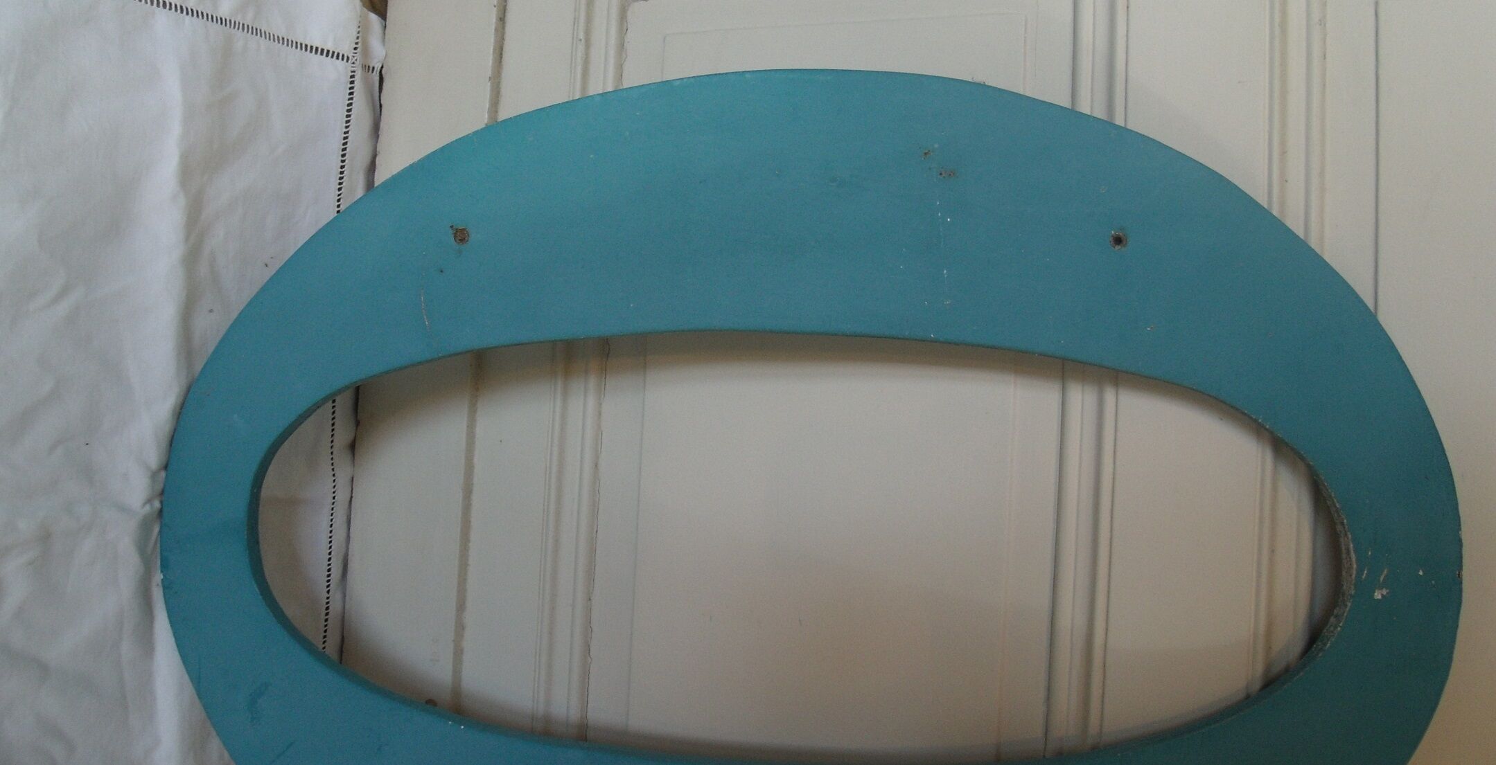 Wooden sign letter O