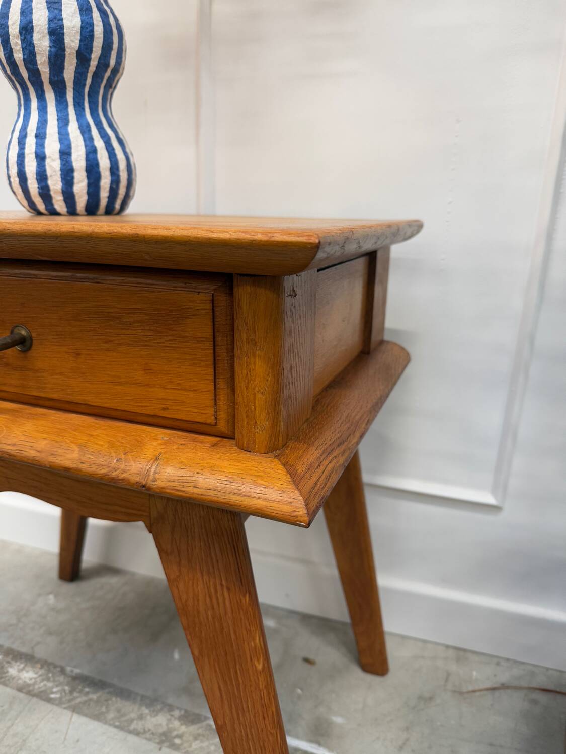 Bedside table with compass feet
