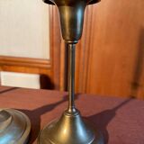 Trio of brass candlesticks