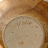 Hollow stoneware dish, signed Yves Loiselet
