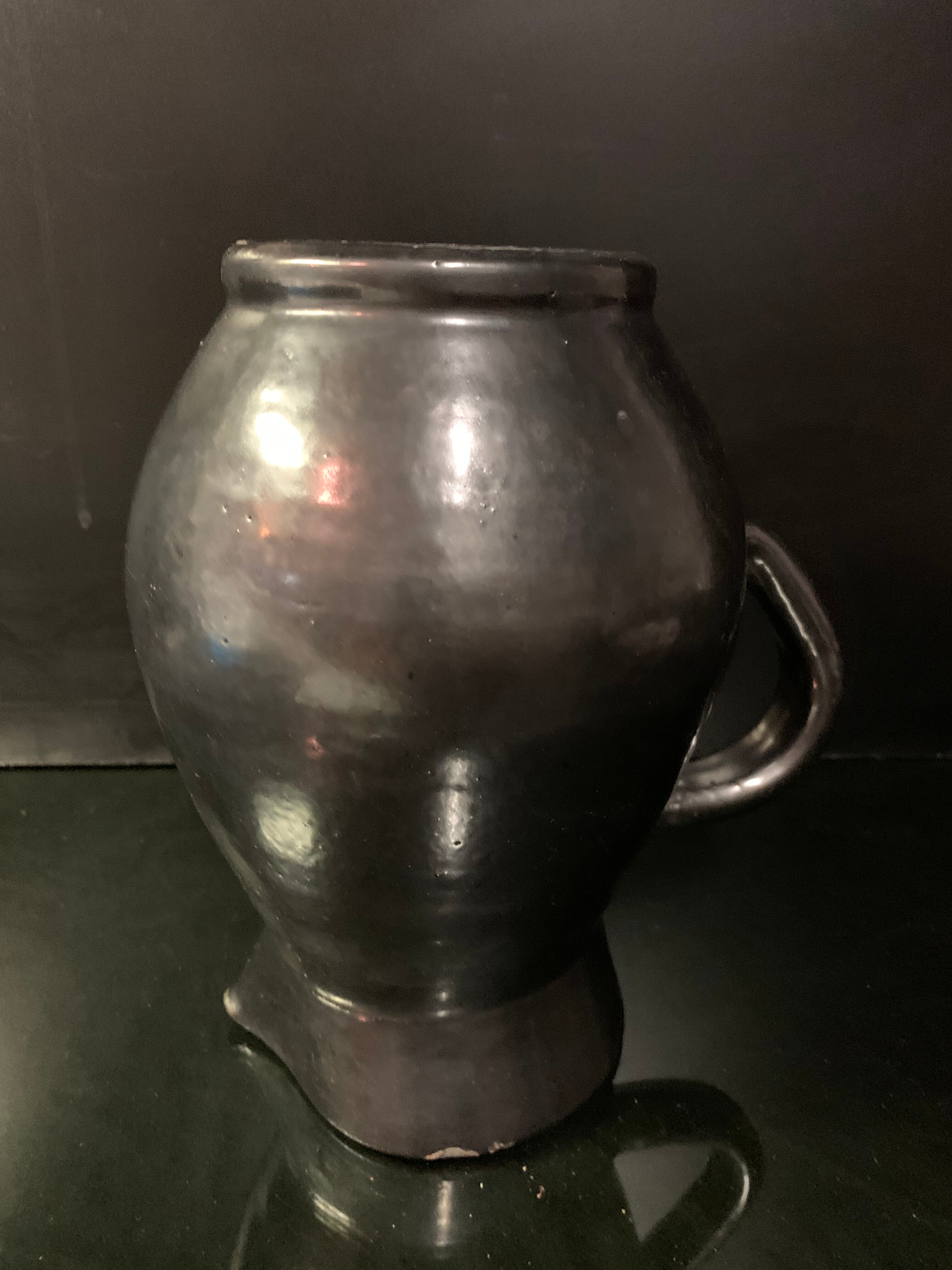 Black ceramic pitcher carafe design 1950