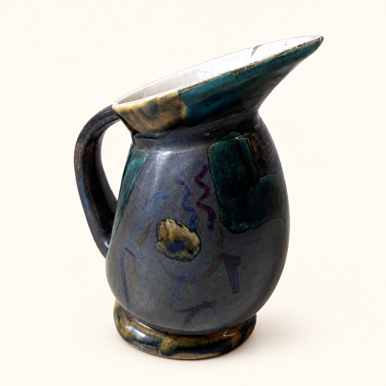 Glazed ceramic pitcher from the 1960s.