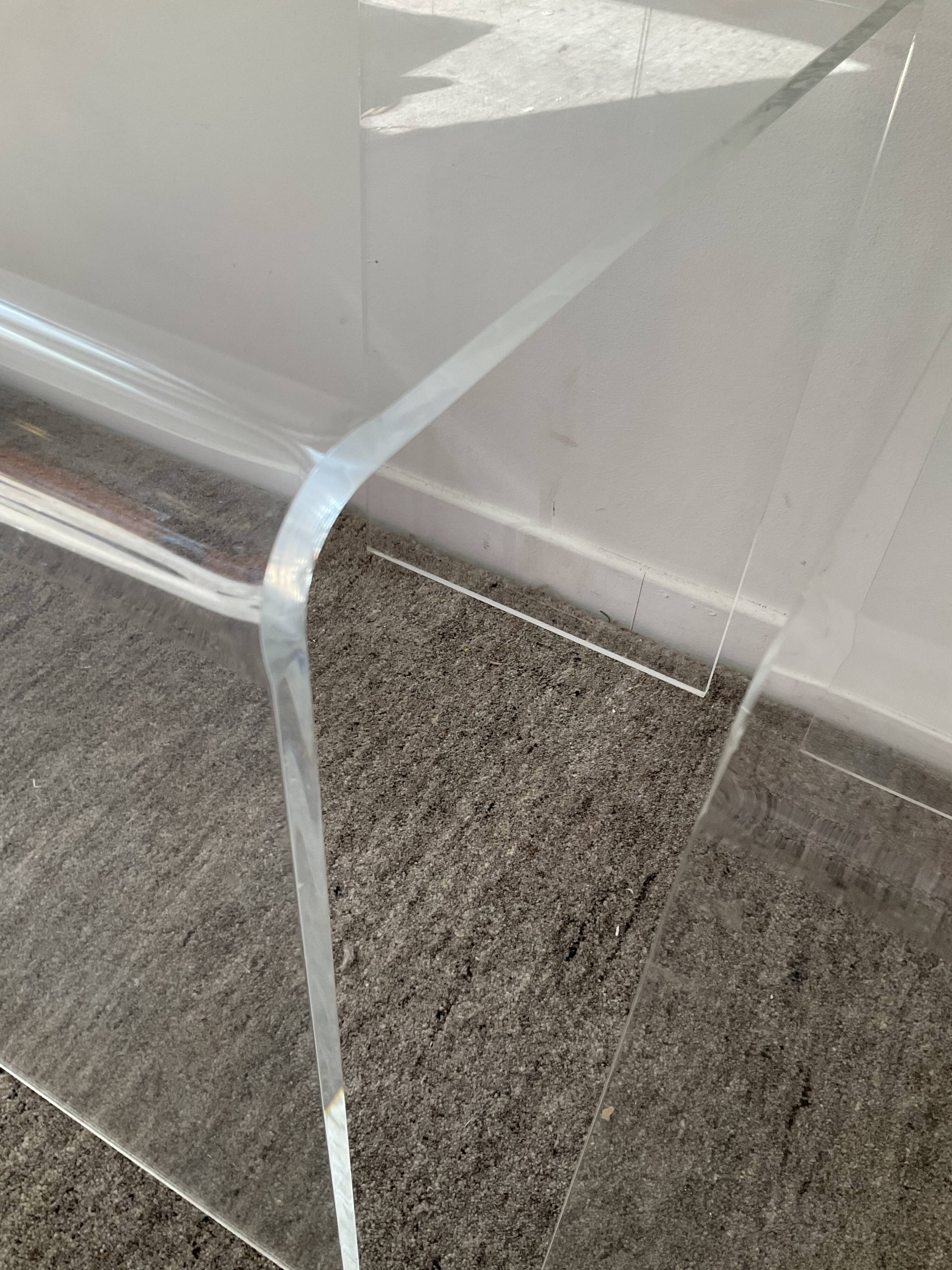 Duo of pull-out tables in plexiglass 70s