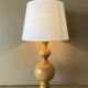 Large old turned wood lamp