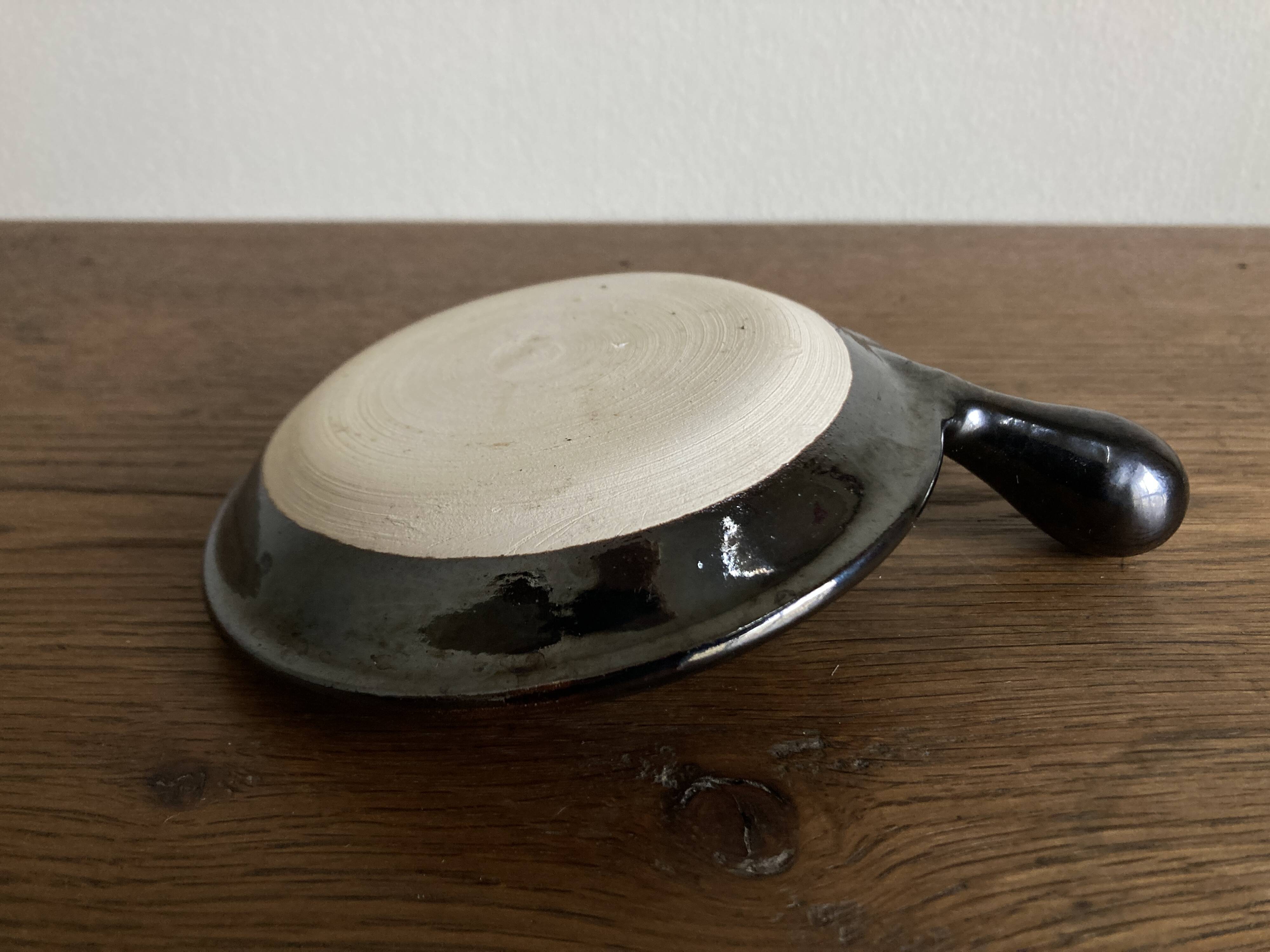 Black glazed earthenware dish 1960