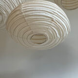 Suspension in rattan and japanese natural linen in the shape of a lantern h50 d30