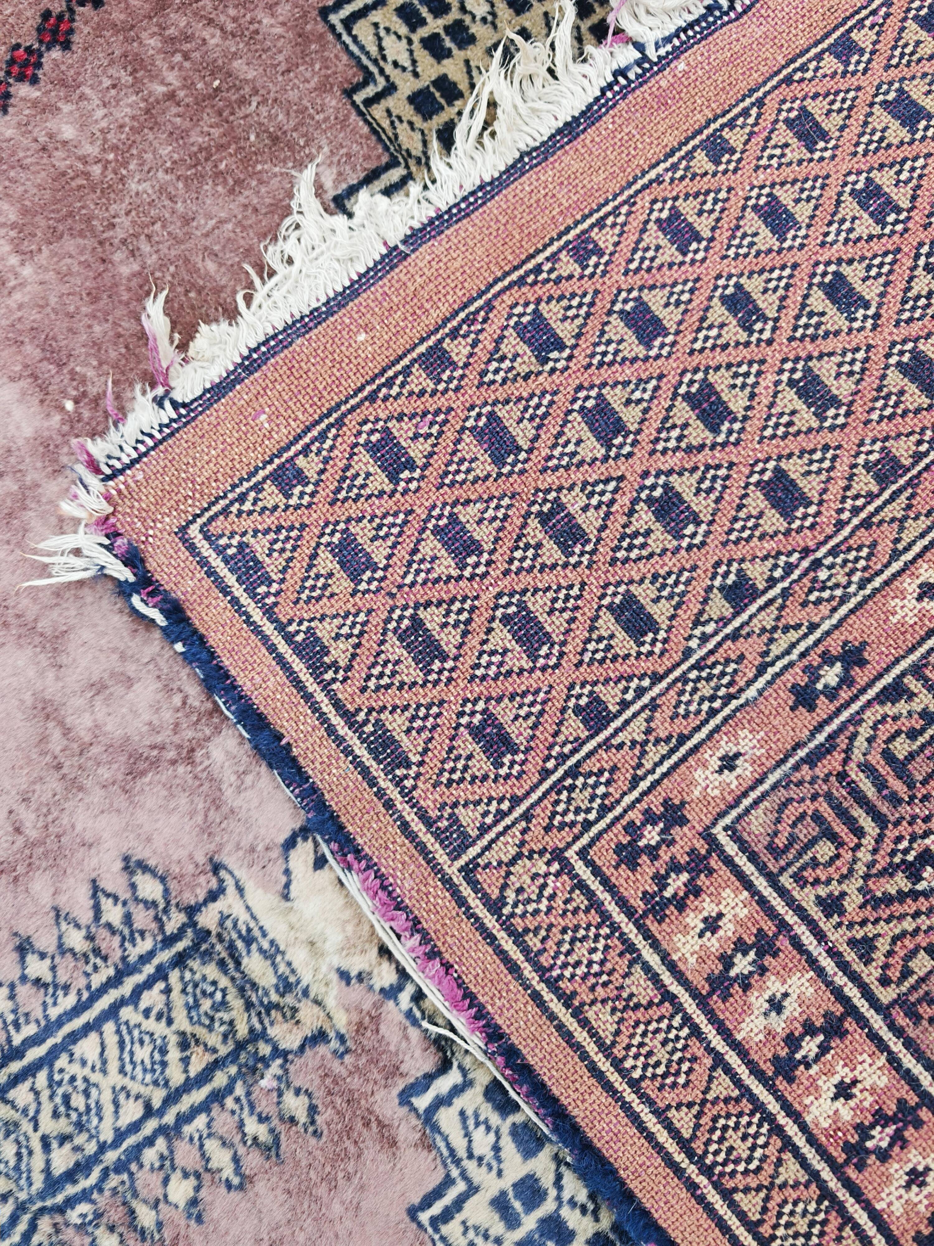Vintage Anatolian prayer rug made of hand-knotted wool.