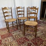 Set of 4 vintage wooden and straw chairs