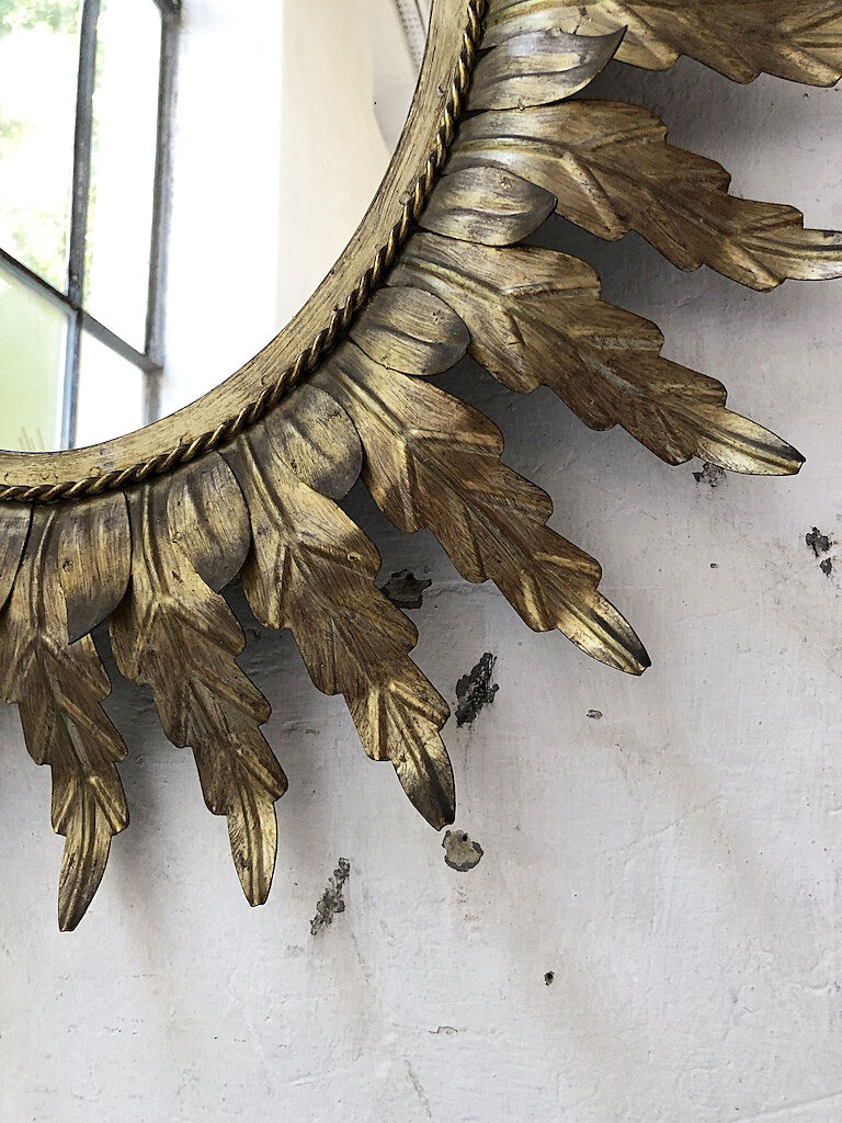 Golden mirror ancient flowery sun