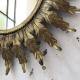 Golden mirror ancient flowery sun