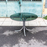 Round table in chromed metal and glass Italia Anni '60