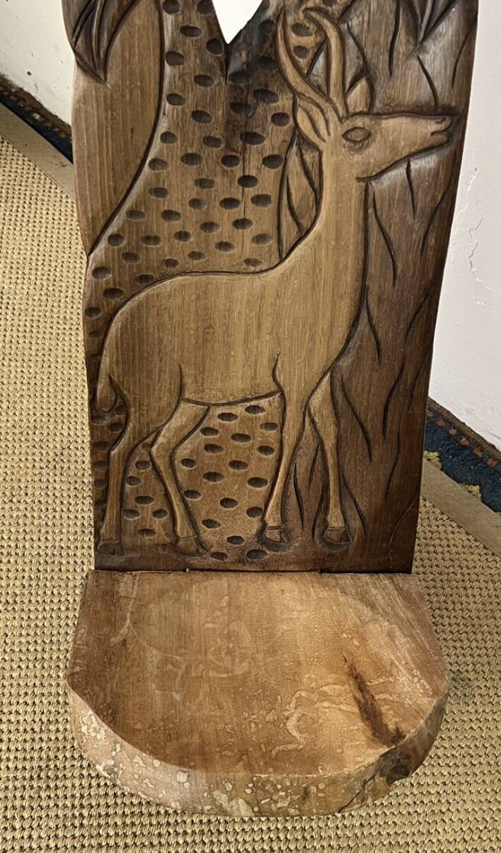 African carved wooden palaver chair
