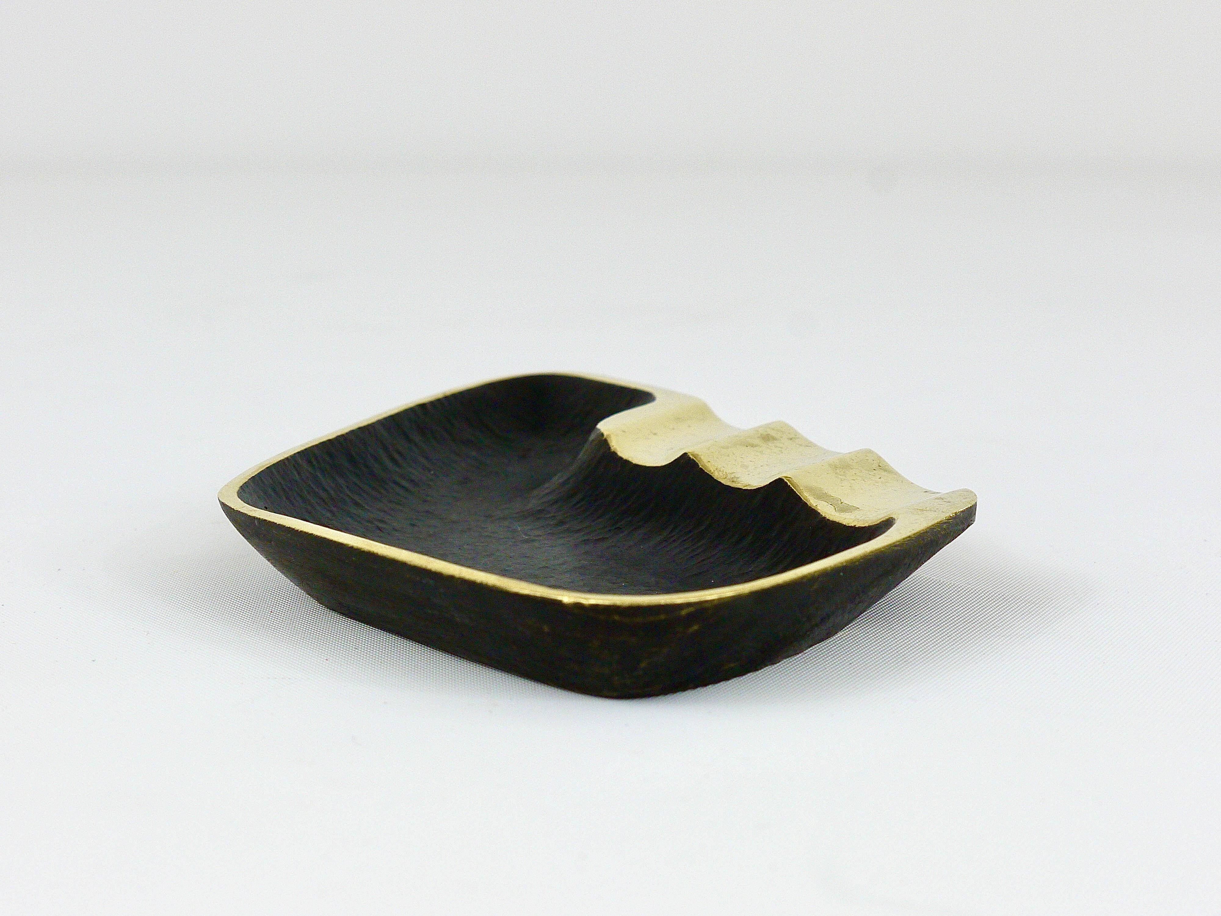 Asymmetrical modernist ashtray by Walter Bosse in black brass by Herta Baller, 1950s.