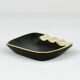 Asymmetrical modernist ashtray by Walter Bosse in black brass by Herta Baller, 1950s.