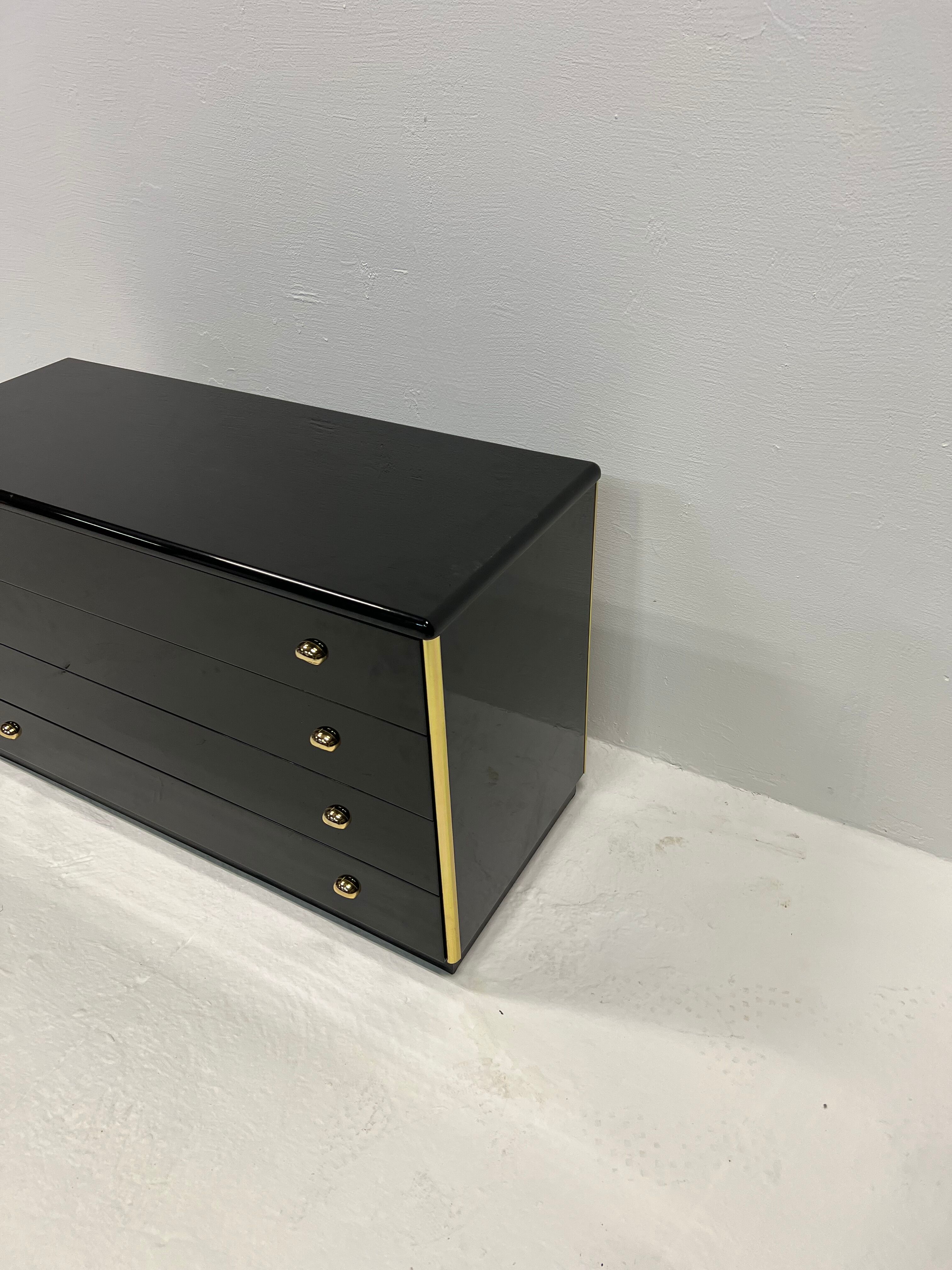 Black lacquered chest of drawers