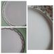 Old mismatched earthenware dessert plates with gold accompanied by a dish