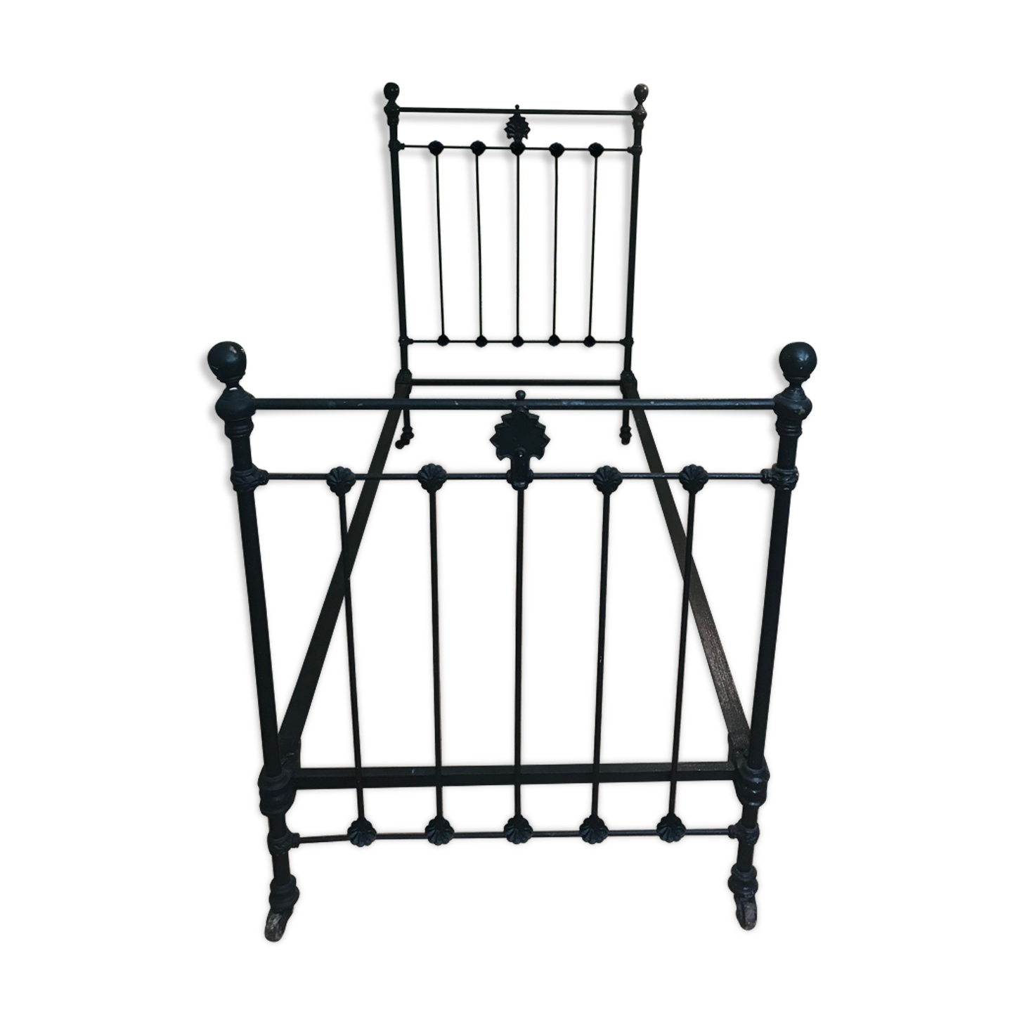 Ancient wrought iron bed