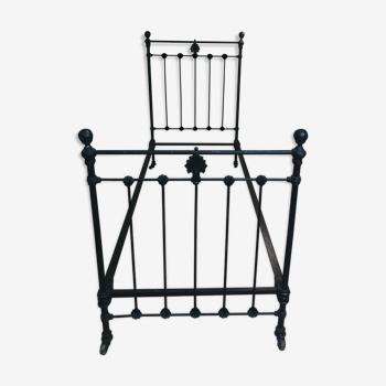 Ancient wrought iron bed