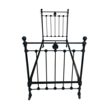 Ancient wrought iron bed