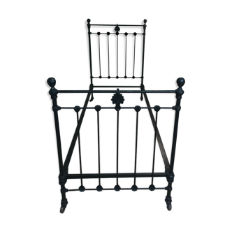 Ancient wrought iron bed