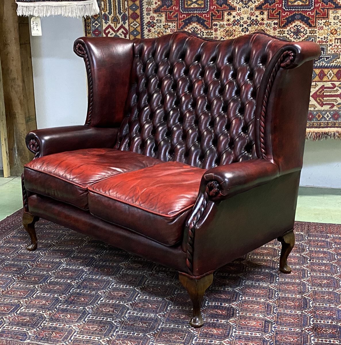 Chesterfield 2-seater leather-eared sofa from the 80s