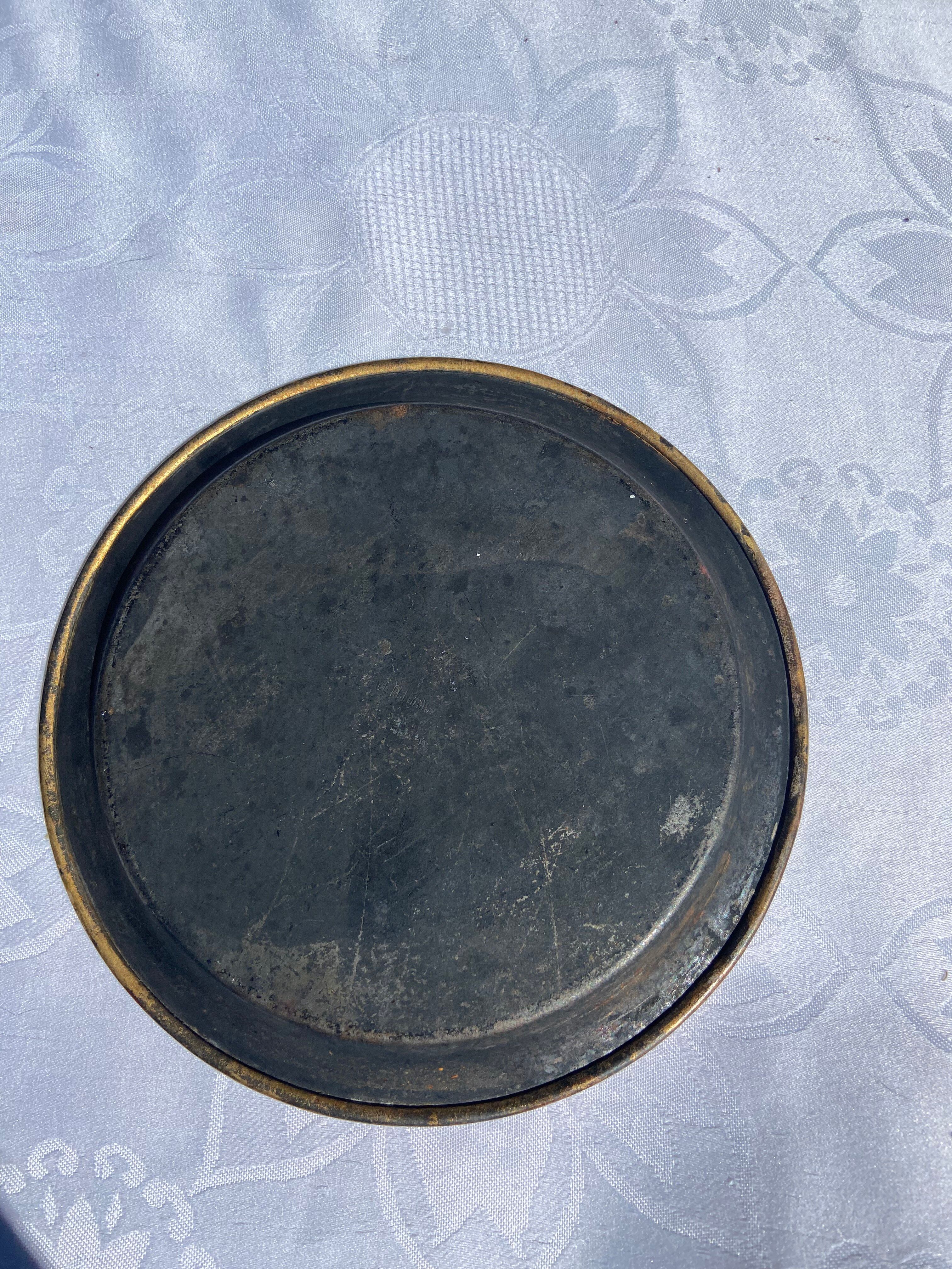 Small antique lacquered dish with hand-painted floral decoration.