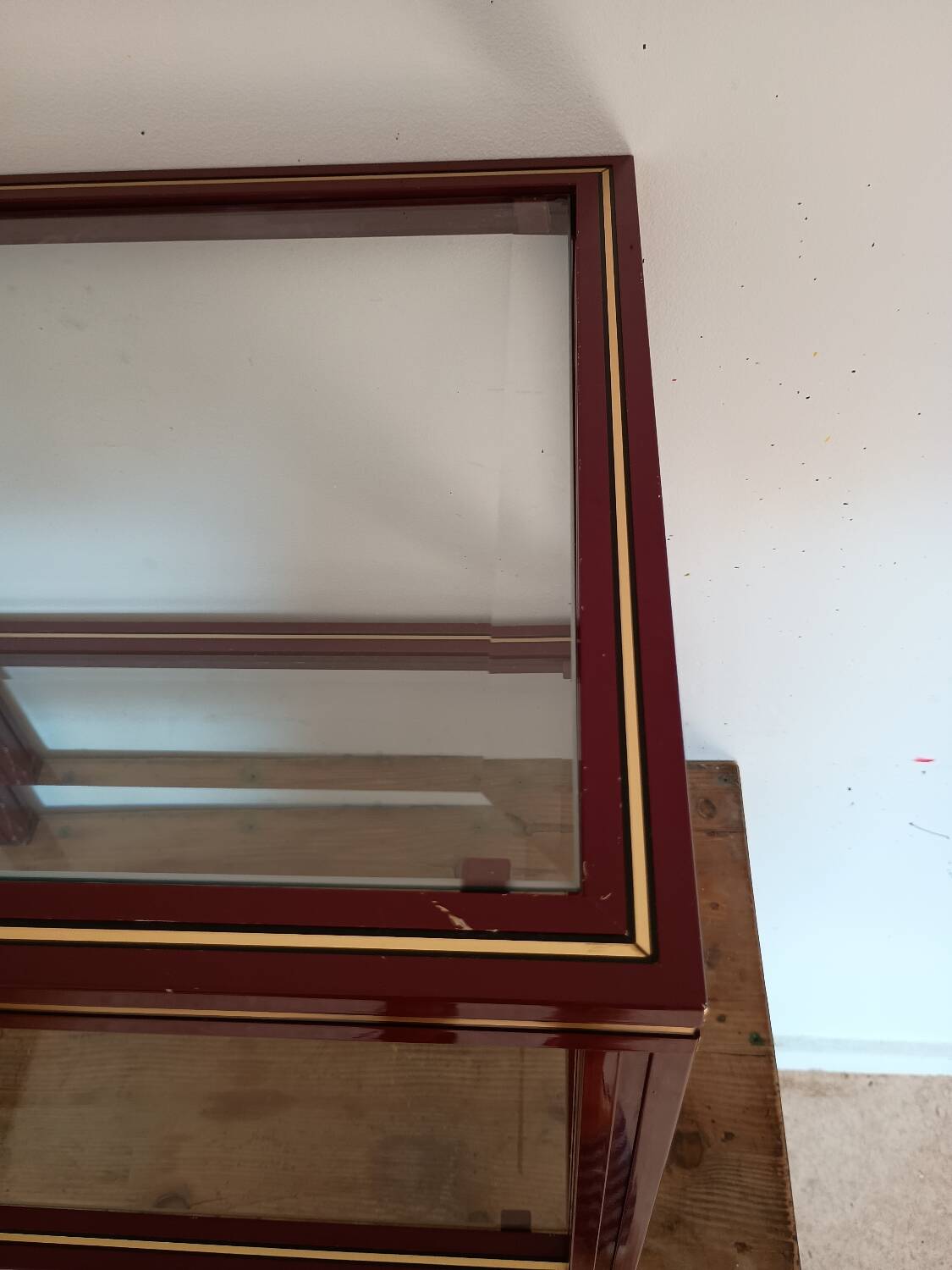 Side table in glass and brass