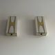 Pair of Loewy wall lights for Hilton, brass and Perspex, France 1965