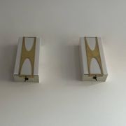 Pair of Loewy wall lights for Hilton, brass and Perspex, France 1965