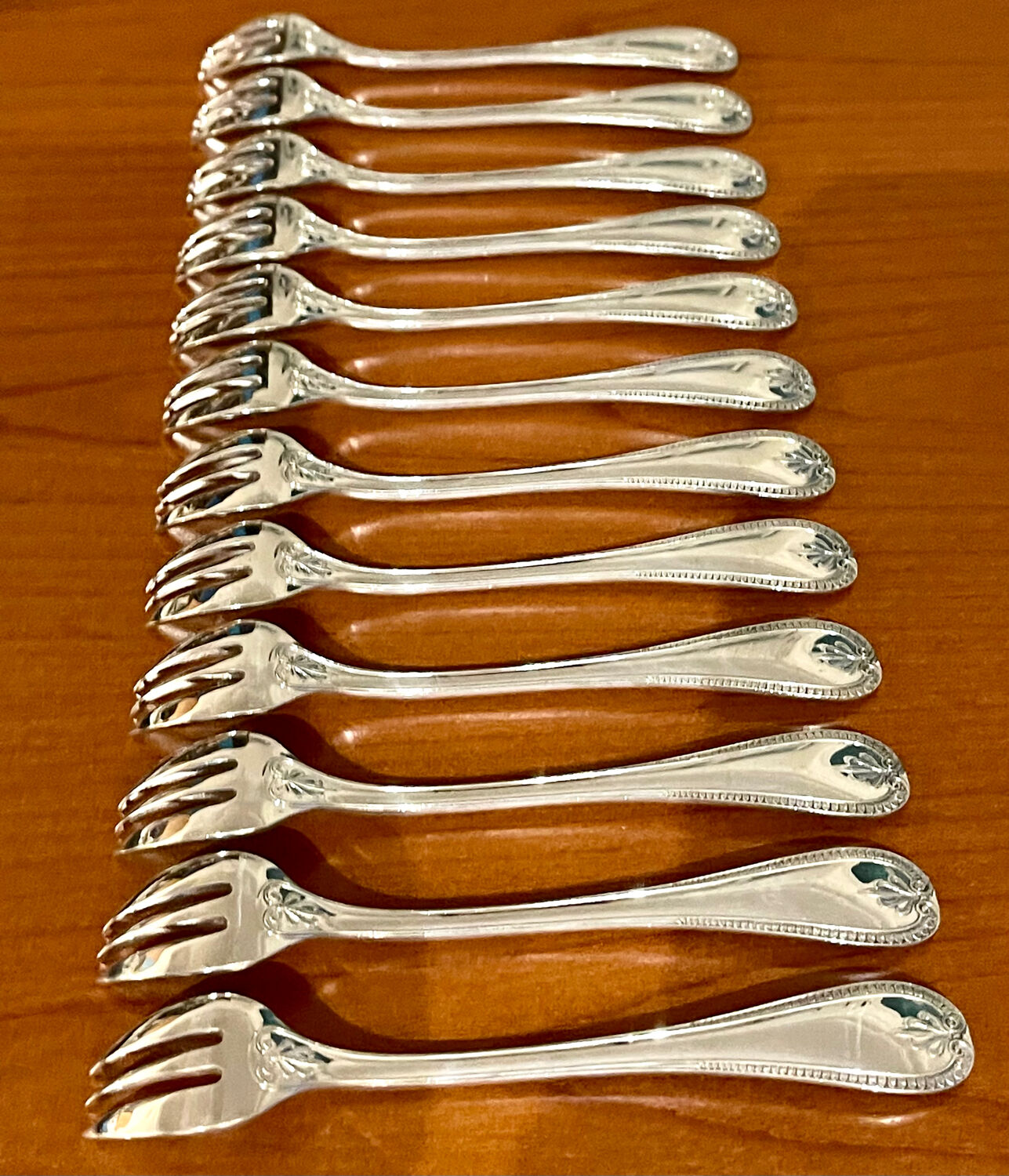 Christofle Malmaison 12 oyster forks, new condition